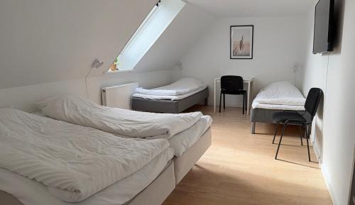 Quadruple Room with Private Bathroom