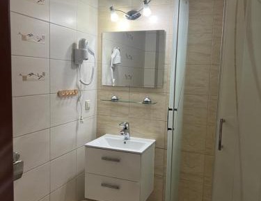 Quadruple Room with Private Bathroom