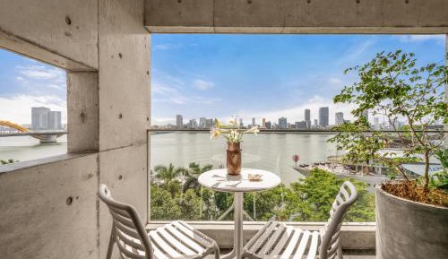 One-Bedroom Apartment with Balcony and River View
