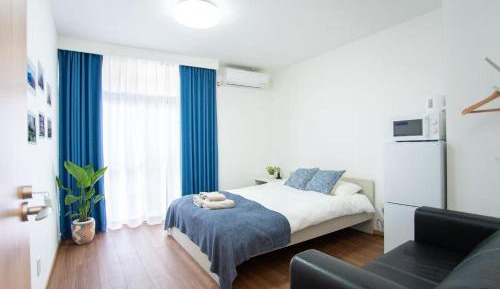 Three-Bedroom Apartment with Balcony