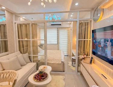 One-Bedroom Apartment with Balcony and City View