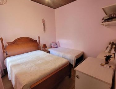 Basic Triple Room with Shared Bathroom