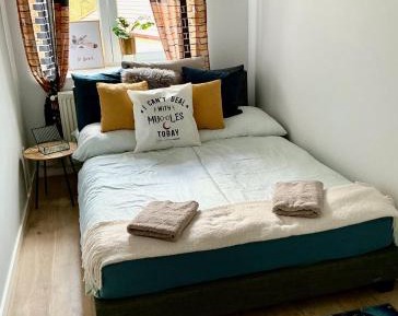 Two-Bedroom Apartment with Balcony and Terrace