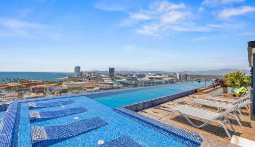 Three-Bedroom Apartment with Harbor View