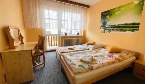Two-Bedroom Apartment with Balcony