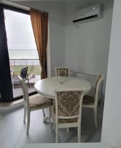 One-Bedroom Apartment with Balcony and Sea View