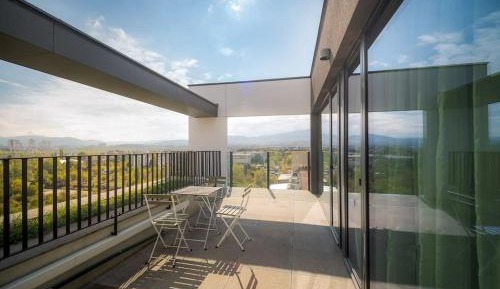 One-Bedroom Apartment with Balcony and Mountain View  