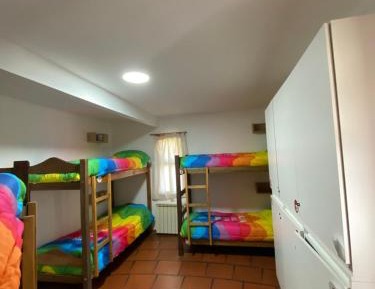 Single Bed in Dormitory Room