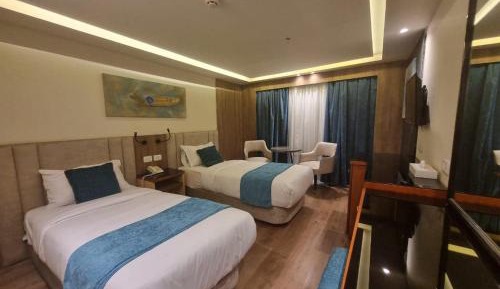 Deluxe Room (2 Adults + 1 Child)