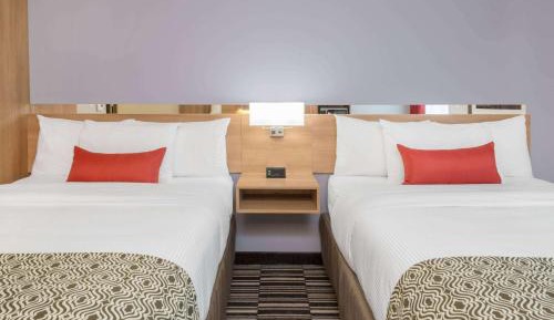 Queen Room with Two Queen Beds and Shower Only - Non-Smoking
