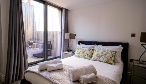 Two-Bedroom Apartment with Balcony and Terrace