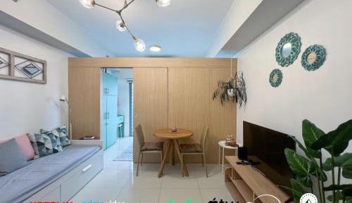 One-Bedroom Apartment with Balcony and City View