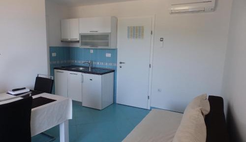 One-Bedroom Apartment with Balcony and Sea View