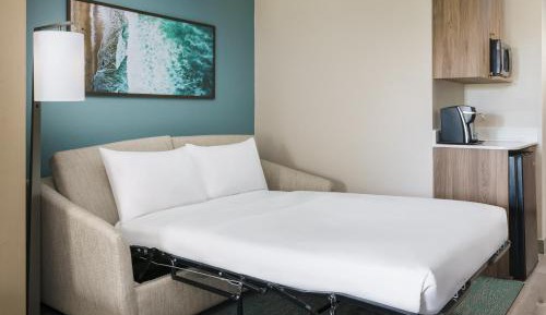 King Suite with Sofa Bed and Pool View