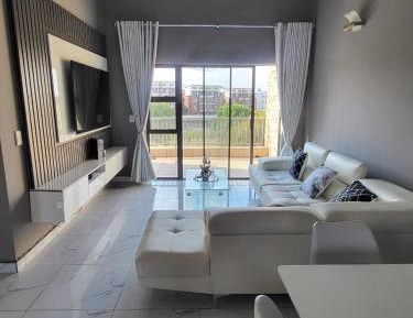 Three-Bedroom Apartment with Balcony