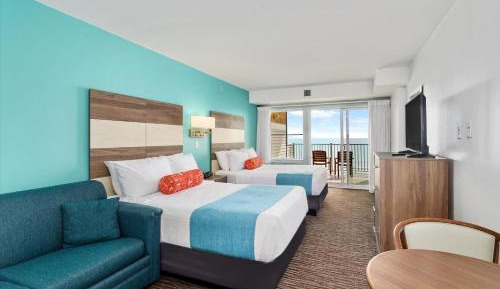 Ocean Front Room with Balcony, 2 Double Beds, Sofa and Kitchenette