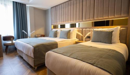 Deluxe Triple Room