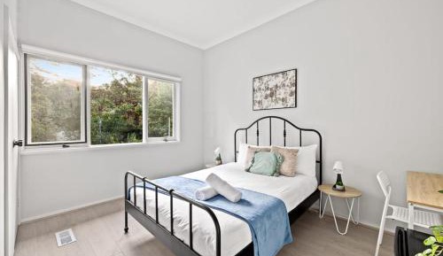 Queen Room with Shared Bathroom