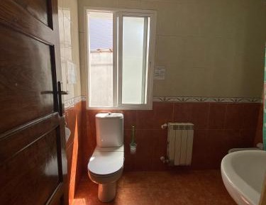 Basic Triple Room with Shared Bathroom