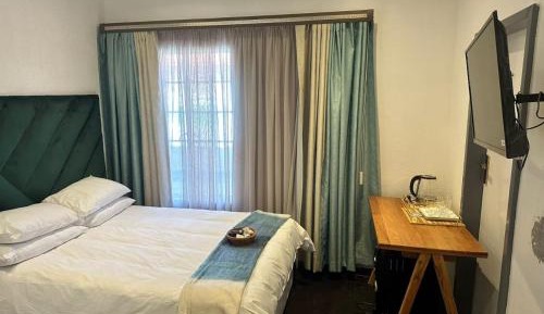 Standard Double Room with Shared Bathroom