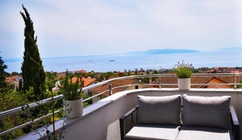 Two-Bedroom Apartment with Balcony and Sea View
