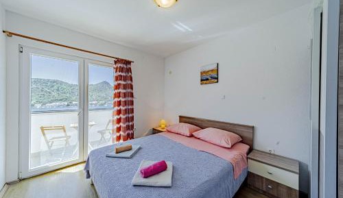 Two-Bedroom Apartment with Balcony and Sea View