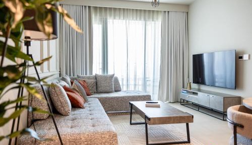 One-Bedroom Apartment with Balcony and City View