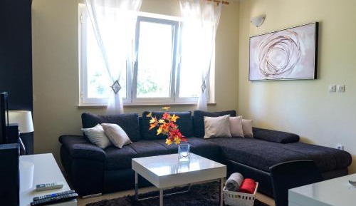 Three-Bedroom Apartment with Terrace and Sea View