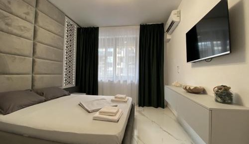 One-Bedroom Apartment with Sea View and Balcony
