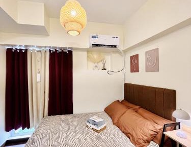 One-Bedroom Apartment with Balcony and City View