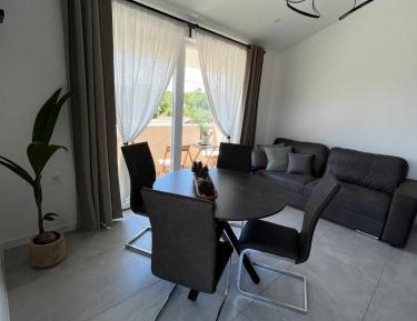 Two-Bedroom Apartment with Balcony and Terrace