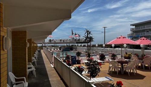 One Bedroom Suite with a Queen Bed, Double Bed Efficiency and Partial Ocean View
