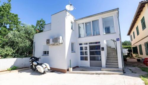 One-Bedroom Apartment with Balcony and City View