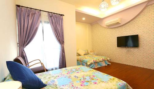 Quadruple Room with Private Bathroom