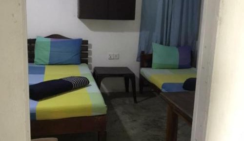 Single Bed in Dormitory Room