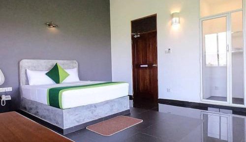 Deluxe Paddy Field View – Private Balcony
