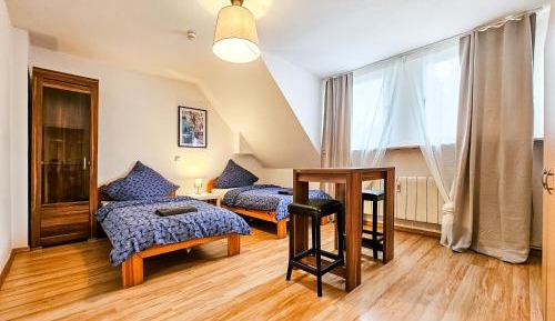 Four-Bedroom Apartment with Balcony 