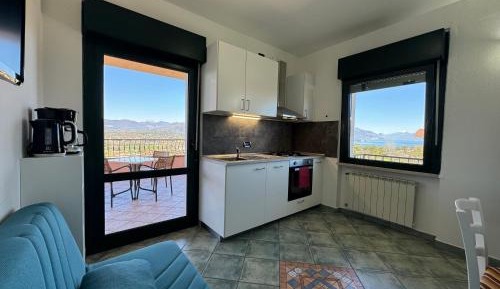 One-Bedroom Apartment with Terrace and Lake View - First Floor