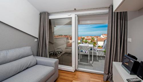 One-Bedroom Apartment with Balcony and Sea View