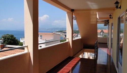 One-Bedroom Apartment with Balcony and Sea View