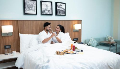 Deluxe King Room with City View & 20% off on Food & Beverages and 2 pieces of ironing daily