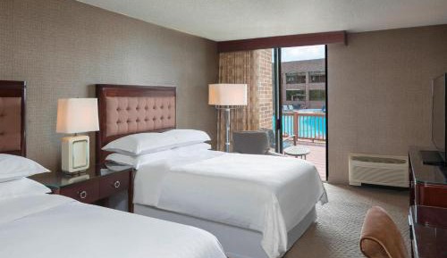 Two Double Beds with Poolview