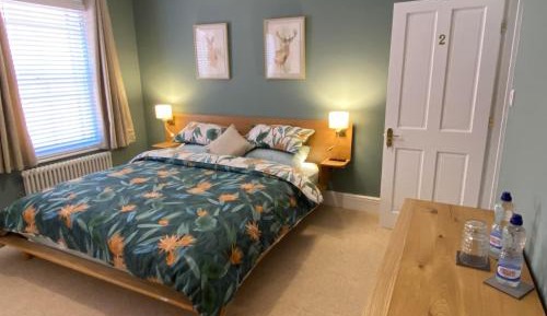 Queen Room with Shared Bathroom