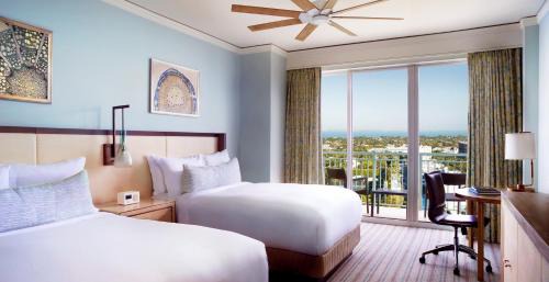 Double Room with Two Double Beds, Balcony and Partial Ocean View