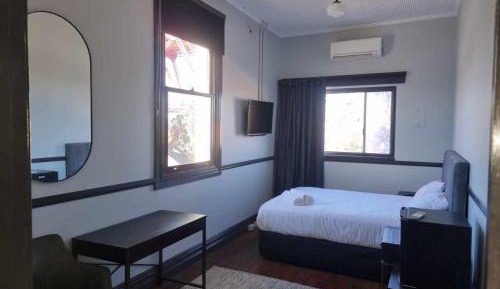 Queen Room with Shared Bathroom