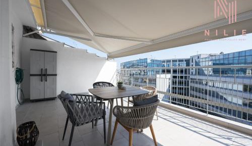 One-Bedroom Apartment with Balcony and City View