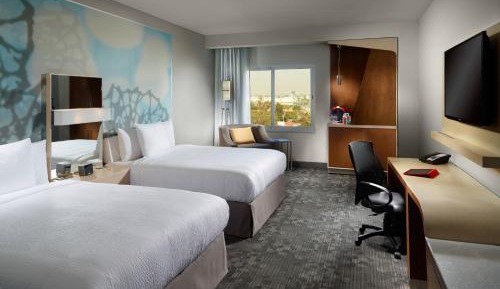 Double Room with Two Double Beds and City View 