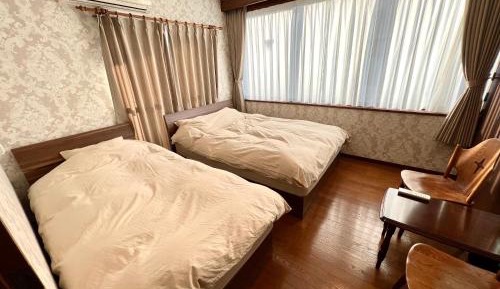 Triple Room with Shared Bathroom