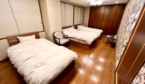Quadruple Room with Shared Bathroom