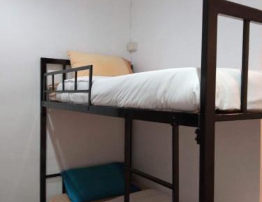 Single Bed in Female Dormitory Room